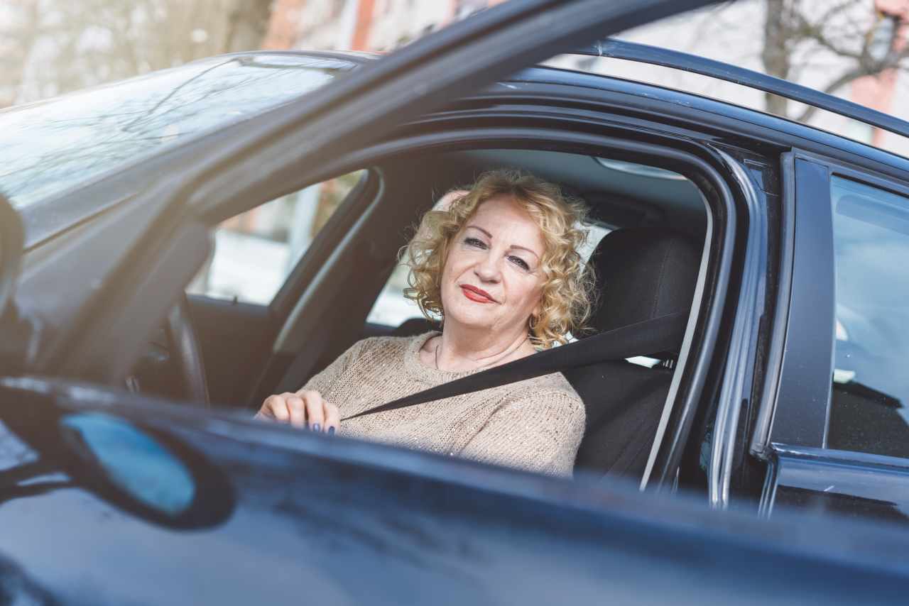 I have $50,000 in credit-card debt after my divorce, but received $30,000 after a car wreck. Do I buy a used Lexus?