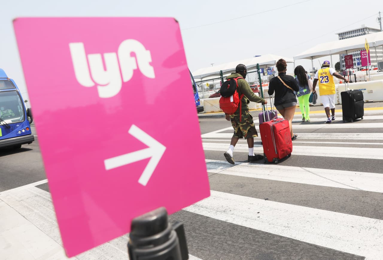 Lyft stock rises on bigger buyback, strong outlook for demand